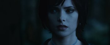 Movie still from “The Twilight Saga: Eclipse” (2010), directed by David Slade – A woman's face in the dark; Close Up shot, Over the shoulder angle