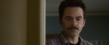 Movie still from “The Twilight Saga: Eclipse” (2010), directed by David Slade – A person with a beard and a mustache; Close Up shot, Over the shoulder angle