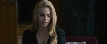 Movie still from “The Twilight Saga: Eclipse” (2010), directed by David Slade – A woman with long blonde hair wearing a black jacket; Close Up shot, Over the shoulder angle