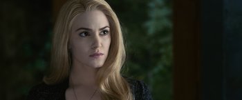 Movie still from “The Twilight Saga: Eclipse” (2010), directed by David Slade – A woman with blonde hair wearing a black top; Close Up shot, Over the shoulder angle