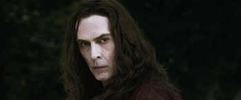 Movie still from “The Twilight Saga: Eclipse” (2010), directed by David Slade – A person with long black hair; Close Up shot, Over the shoulder angle