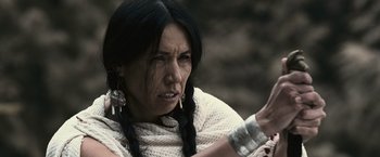 Movie still from “The Twilight Saga: Eclipse” (2010), directed by David Slade – A native american woman with long black hair; Close Up shot, Over the shoulder angle