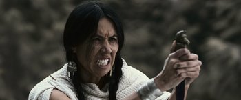 Movie still from “The Twilight Saga: Eclipse” (2010), directed by David Slade – An angry woman with her hands raised in the air; Close Up shot, Low angle