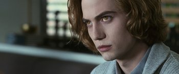 Movie still from “The Twilight Saga: Eclipse” (2010), directed by David Slade – A person with long brown hair; Close Up shot, Over the shoulder angle