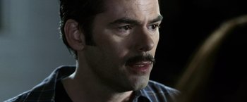 Movie still from “The Twilight Saga: Eclipse” (2010), directed by David Slade – A person with a mustache; Close Up shot, Over the shoulder angle