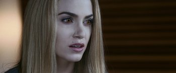 Movie still from “The Twilight Saga: Eclipse” (2010), directed by David Slade – A person with long blonde hair; Close Up shot, Over the shoulder angle