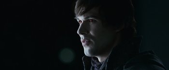 Movie still from “The Twilight Saga: Eclipse” (2010), directed by David Slade – A person wearing a black shirt; Close Up shot, Over the shoulder angle