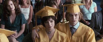 Movie still from “The Twilight Saga: Eclipse” (2010), directed by David Slade – A woman in a graduation cap and gown; Close Up shot, Low angle