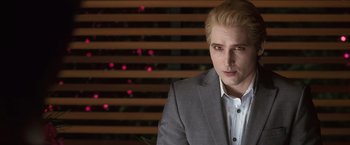 Movie still from “The Twilight Saga: Eclipse” (2010), directed by David Slade – A man wearing a suit and a white dress shirt; Close Up shot, Over the shoulder angle