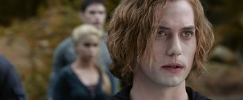 Movie still from “The Twilight Saga: Eclipse” (2010), directed by David Slade – A person with long blonde hair; Close Up shot, Over the shoulder angle