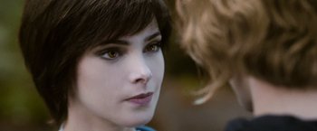 Movie still from “The Twilight Saga: Eclipse” (2010), directed by David Slade – A woman's face with yellow eyes; Close Up shot, Over the shoulder angle