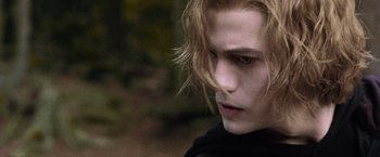 Movie still from “The Twilight Saga: Eclipse” (2010), directed by David Slade – A person with long blonde hair; Close Up shot, Over the shoulder angle
