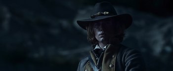 Movie still from “The Twilight Saga: Eclipse” (2010), directed by David Slade – A man wearing a hat and a jacket; Close Up shot, Low angle