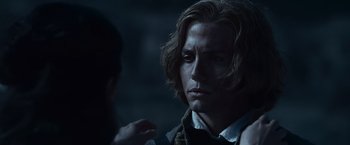 Movie still from “The Twilight Saga: Eclipse” (2010), directed by David Slade – A man with long brown hair is looking at another man with long brown hair; Close Up shot, Over the shoulder angle