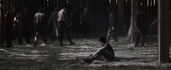 Movie still from “The Twilight Saga: Eclipse” (2010), directed by David Slade – A group of people walking around a field; Wide shot, High angle