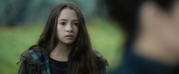 Movie still from “The Twilight Saga: Eclipse” (2010), directed by David Slade – A young woman with long hair and a black shirt; Close Up shot, Over the shoulder angle