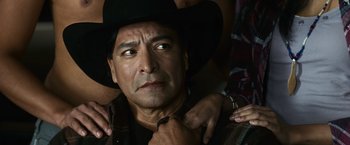 Movie still from “The Twilight Saga: Eclipse” (2010), directed by David Slade – A person wearing a cowboy hat; Close Up shot, Over the shoulder angle