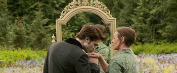 Movie still from “The Twilight Saga: New Moon” (2009), directed by Chris Weitz – A man and a woman looking at each other in front of an ornate mirror; Close Up shot, Over the shoulder angle
