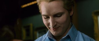 Movie still from “The Twilight Saga: New Moon” (2009), directed by Chris Weitz – A person wearing a blue dress shirt; Close Up shot, Low angle