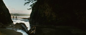 Movie still from “The Twilight Saga: New Moon” (2009), directed by Chris Weitz – A boat in a body of water next to a cliff; Extreme Wide shot, Low angle