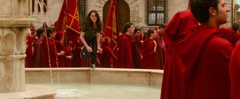 Movie still from “The Twilight Saga: New Moon” (2009), directed by Chris Weitz – A group of young people dressed up in red robes; Wide shot, High angle