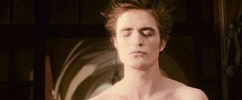 Movie still from “The Twilight Saga: New Moon” (2009), directed by Chris Weitz – A man with his eyes closed with his eyes closed; Close Up shot, Low angle