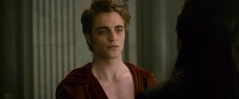 Movie still from “The Twilight Saga: New Moon” (2009), directed by Chris Weitz – A person wearing a red shirt; Close Up shot, Over the shoulder angle
