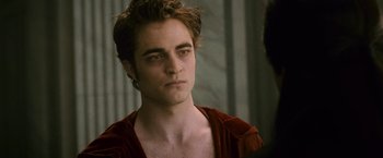 Movie still from “The Twilight Saga: New Moon” (2009), directed by Chris Weitz – A person wearing a red shirt; Close Up shot, Over the shoulder angle