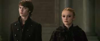 Movie still from “The Twilight Saga: New Moon” (2009), directed by Chris Weitz – A young man and a young woman standing next to each other; Close Up shot, Over the shoulder angle