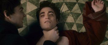 Movie still from “The Twilight Saga: New Moon” (2009), directed by Chris Weitz – A person laying on the ground; Close Up shot, Overhead angle