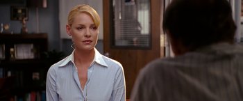 Movie still from “The Ugly Truth” (2009), directed by Robert Luketic – A woman standing in front of a man; Close Up shot, Over the shoulder angle