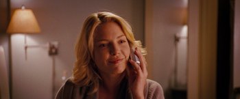Movie still from “The Ugly Truth” (2009), directed by Robert Luketic – A beautiful blond woman talking on a cell phone; Close Up shot, Over the shoulder angle