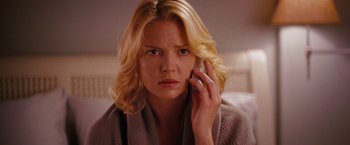 Movie still from “The Ugly Truth” (2009), directed by Robert Luketic – A woman is talking on a cell phone; Close Up shot, Low angle