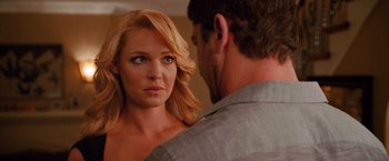 Movie still from “The Ugly Truth” (2009), directed by Robert Luketic – A man and a woman looking at one another in a mirror; Close Up shot, Over the shoulder angle