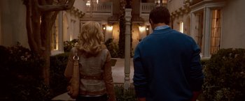 Movie still from “The Ugly Truth” (2009), directed by Robert Luketic – A man and a woman are looking at each other; Medium shot, Over the shoulder angle