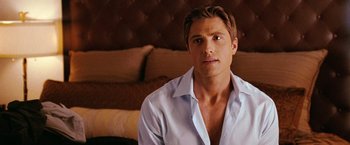 Movie still from “The Ugly Truth” (2009), directed by Robert Luketic – A person wearing a white shirt; Close Up shot, Over the shoulder angle