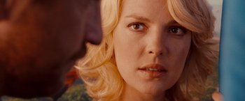 Movie still from “The Ugly Truth” (2009), directed by Robert Luketic – A person with blonde hair; Close Up shot, Over the shoulder angle