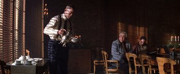 Movie still from “Enemy of the State” (1998), directed by Tony Scott – Medium shot, Low angle