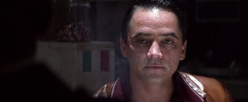 Movie still from “Enemy of the State” (1998), directed by Tony Scott – A person wearing a jacket; Close Up shot, Low angle