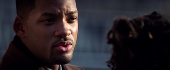 Movie still from “Enemy of the State” (1998), directed by Tony Scott – A man's face and a woman's face; Close Up shot, Over the shoulder angle