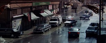 Movie still from “Enemy of the State” (1998), directed by Tony Scott – A bunch of cars that are on the street; Extreme Wide shot, High angle