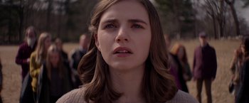 Movie still from “The Unholy” (2021), directed by Evan Spiliotopoulos – A person with long brown hair; Close Up shot, Over the shoulder angle