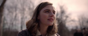 Movie still from “The Unholy” (2021), directed by Evan Spiliotopoulos – A person looking up at the sky; Close Up shot, Low angle