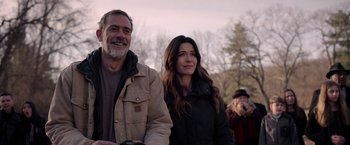 Movie still from “The Unholy” (2021), directed by Evan Spiliotopoulos – A man and a woman standing next to each other in front of trees; Medium shot, Over the shoulder angle