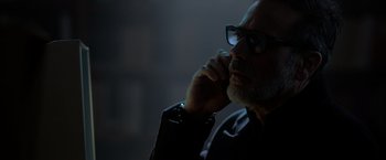 Movie still from “The Unholy” (2021), directed by Evan Spiliotopoulos – A person wearing glasses; Close Up shot, Low angle