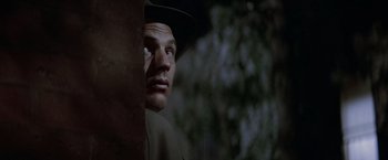 Movie still from “The Untouchables” (1987), directed by Brian De Palma – A person wearing a hat; Close Up shot, Low angle