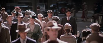 Movie still from “The Untouchables” (1987), directed by Brian De Palma – A group of people wearing hats and suits; Wide shot, High angle