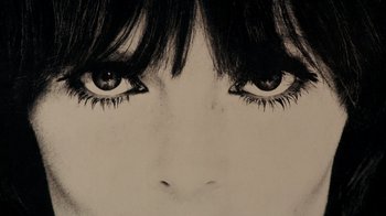 Movie still from “The Velvet Underground” (2021), directed by Todd Haynes – Picture of a woman's eyes with long lashes; Extreme Close Up shot, Overhead angle