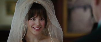Movie still from “The Vow” (2012), directed by Michael Sucsy – A woman in a veil smiling for the camera; Close Up shot, Over the shoulder angle