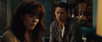 Movie still from “The Vow” (2012), directed by Michael Sucsy – A man and a woman sitting next to each other in a room; Close Up shot, Over the shoulder angle